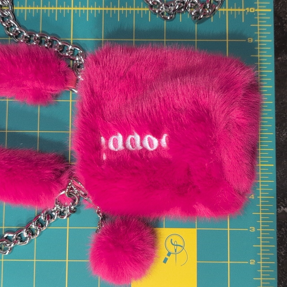 Poppi Pink Fuzzy Can Bag